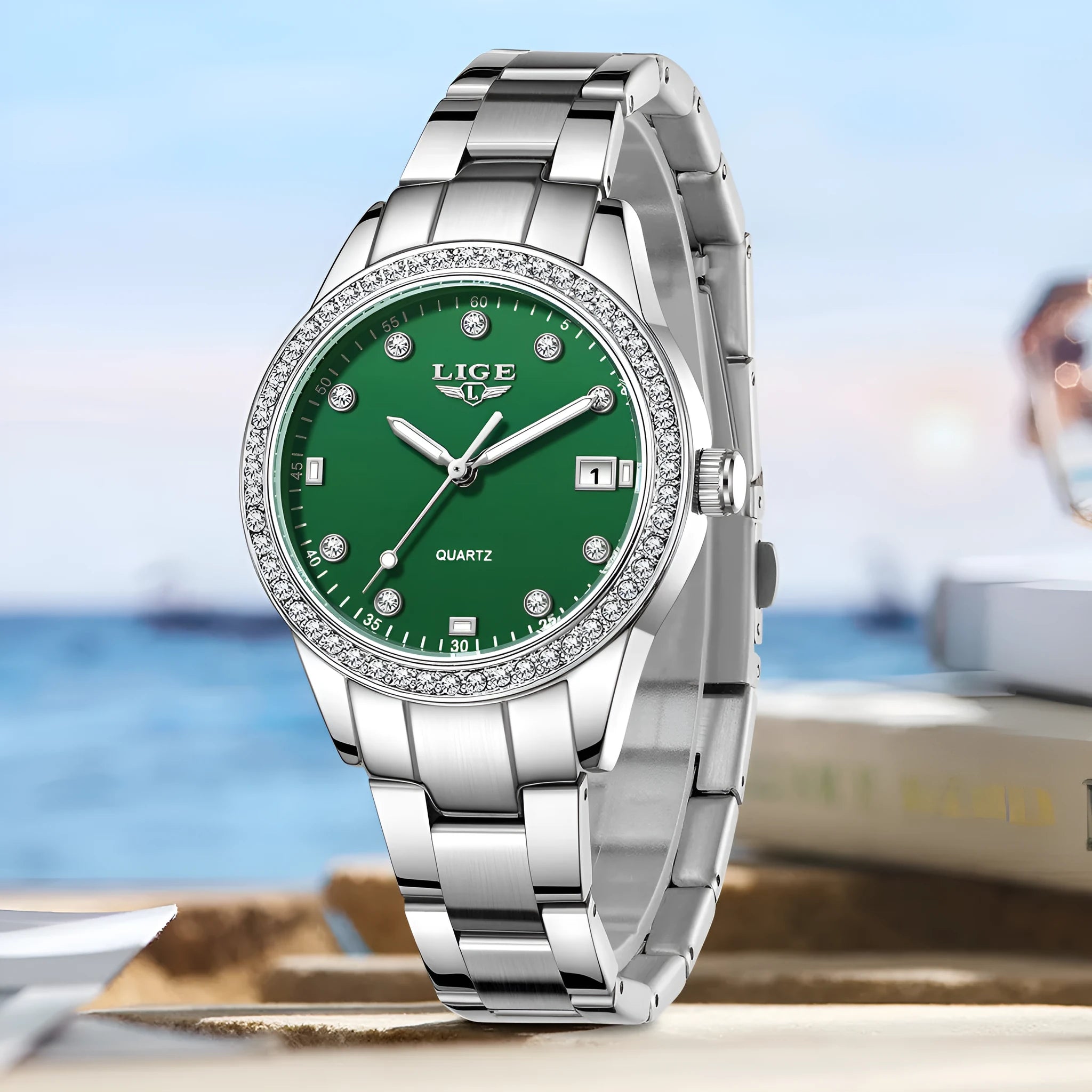 Women's silver fashion watch with diamond-encrusted bezel and luminous hands on 34mm stainless steel case