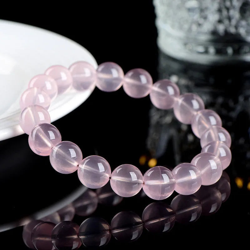 Natural starlight crystal round bead bracelet with pink star colour options and measured bead sizing