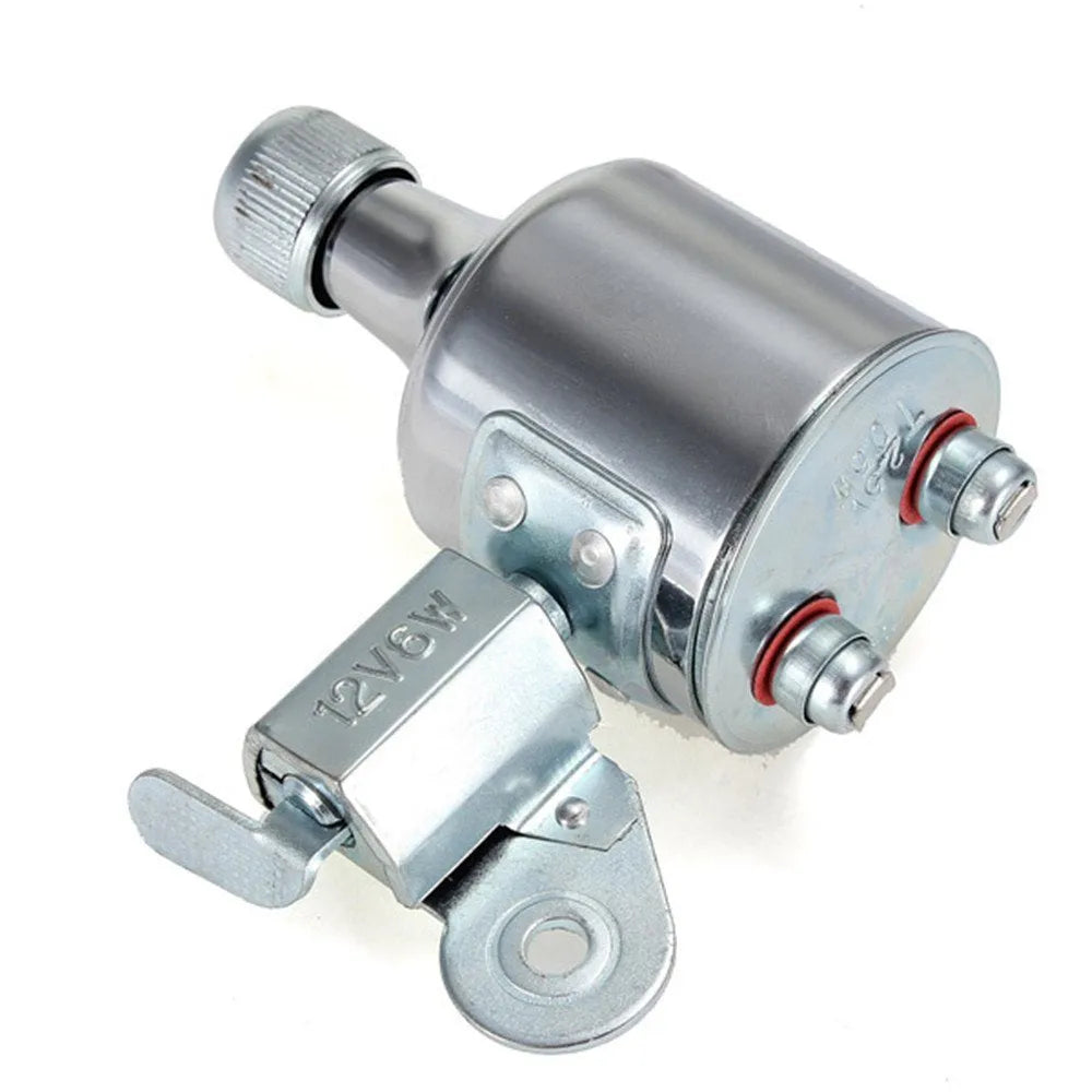 Silver bicycle dynamo generator light kit mounted on a bike fork, with wires for headlight and tail light connections.