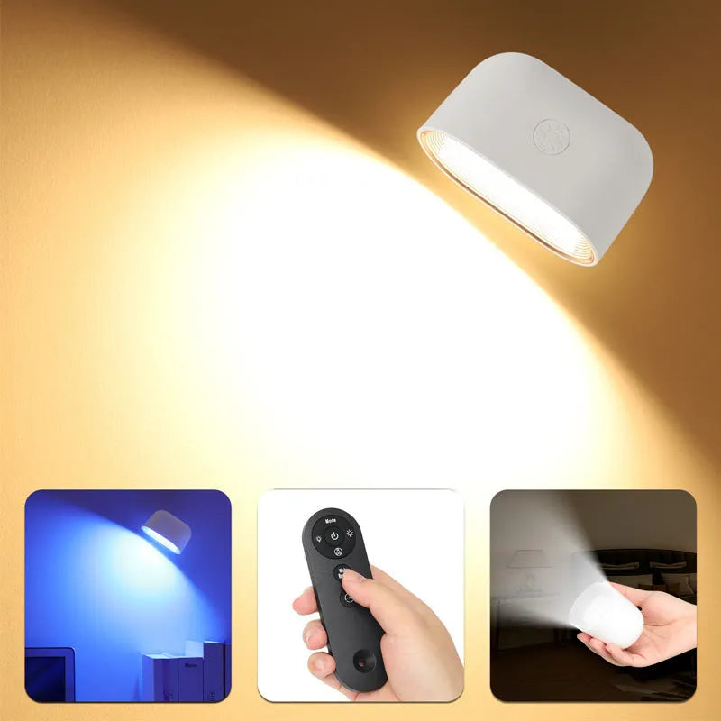 White plastic remote control magnetic wall lamp with colour-changing LED lights on a wall.