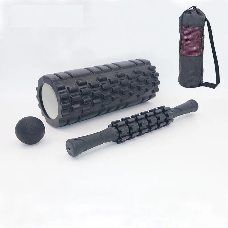 Black fitness foam roller massage stick measuring 33cm in length.