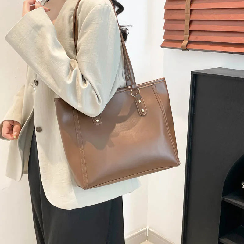 Korean style square shoulder underarm crossbody bag in PU leather, showing sandwich pocket detail.
