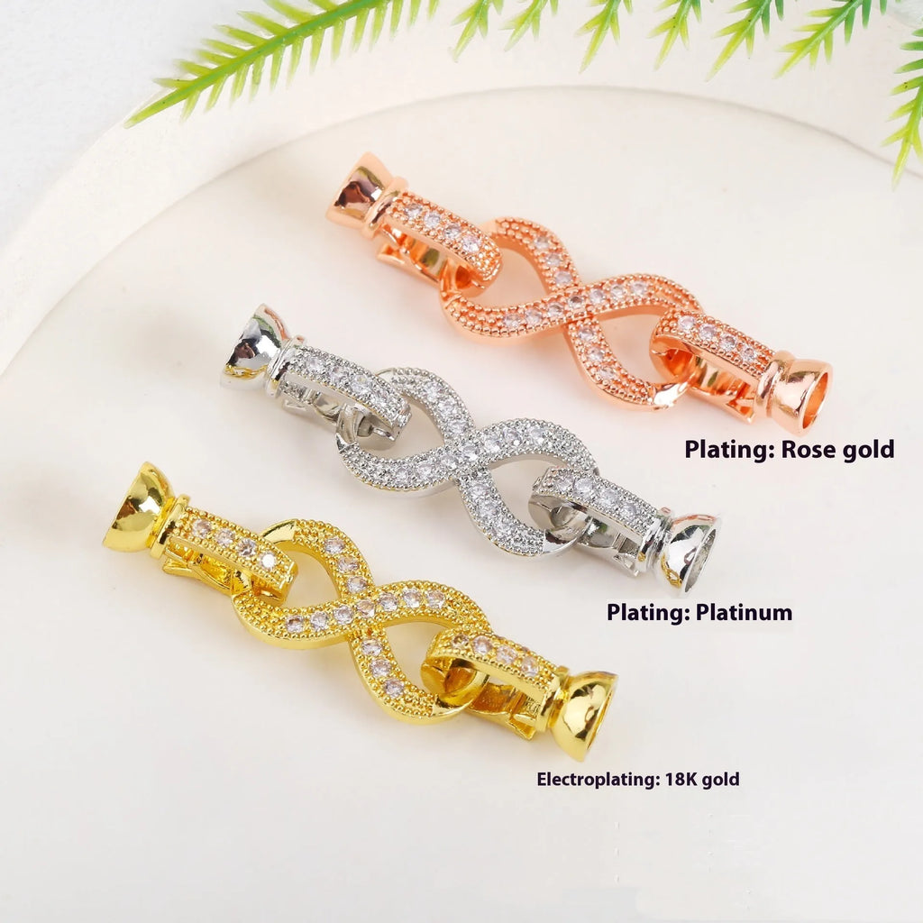 Small gold electroplated chain buckle clasp for DIY jewellery making on white background