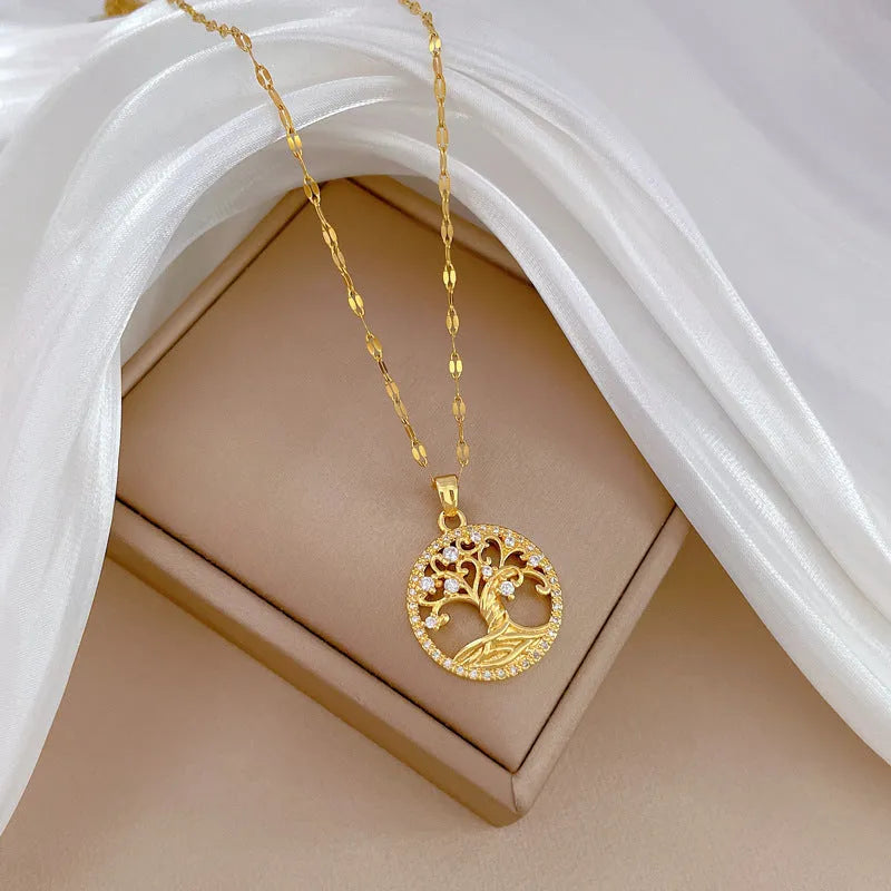 Gold-plated rhinestone lucky tree light necklace with mother-of-pearl detail on adjustable stainless steel chain
