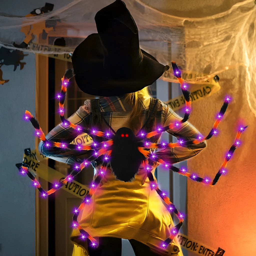 Halloween Spider Backpack with LED lights in plush sugar bag material, shown in orange and purple colour variant.