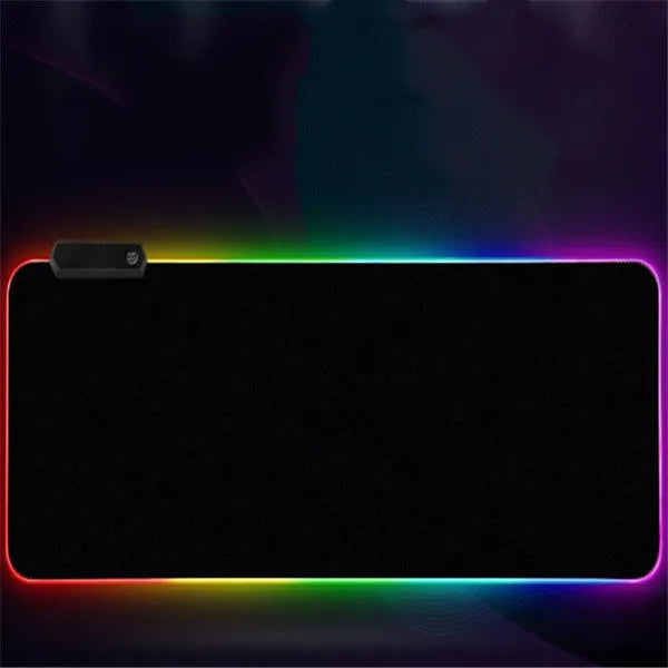 Luminous table mat gaming mouse pad with RGB illumination and non-slip rubber base in black on a wooden desk