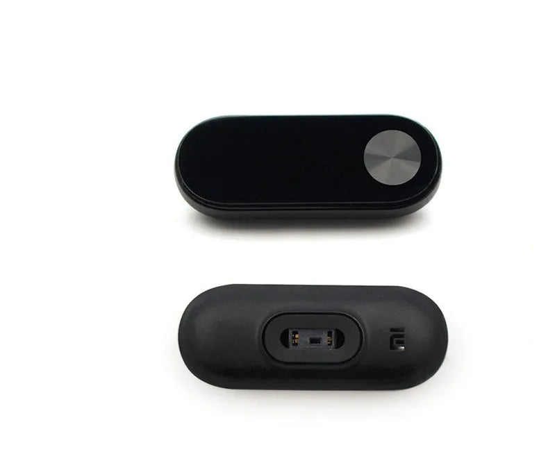 Xiaomi Mi Band 2 black fitness band with OLED screen showing heart rate data on a wrist.