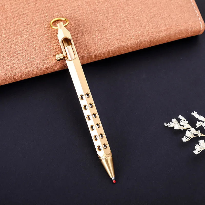 Brass hexagonal bolt pen with 0.5mm tip showing hexagonal profile and signature roller mechanism