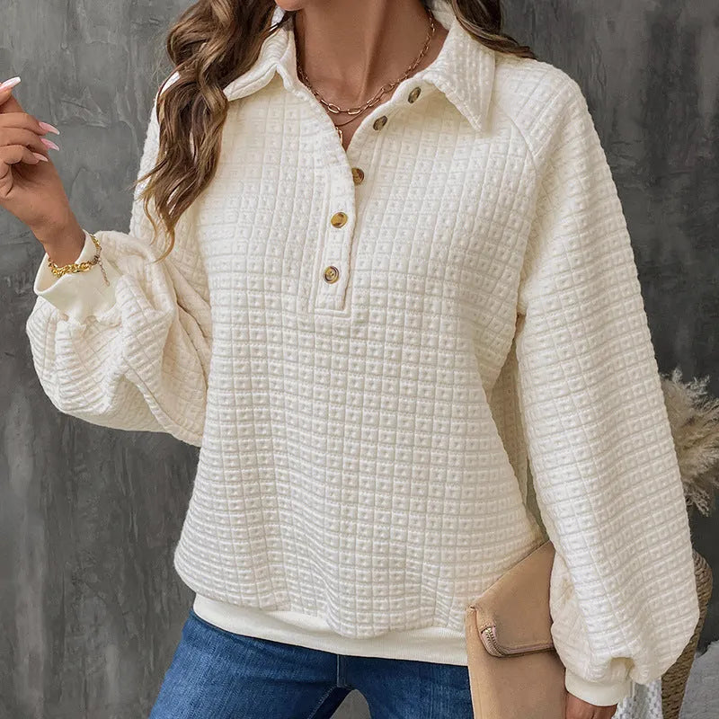 Women's milky white polo collar sweater with long sleeves and textured fabric.