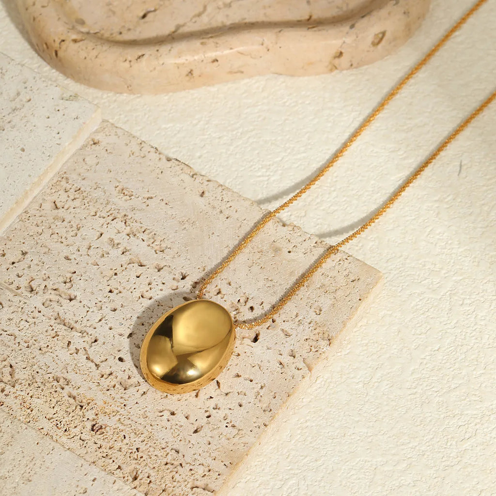 Gold geometric pendant necklace on adjustable 41-50cm stainless steel chain