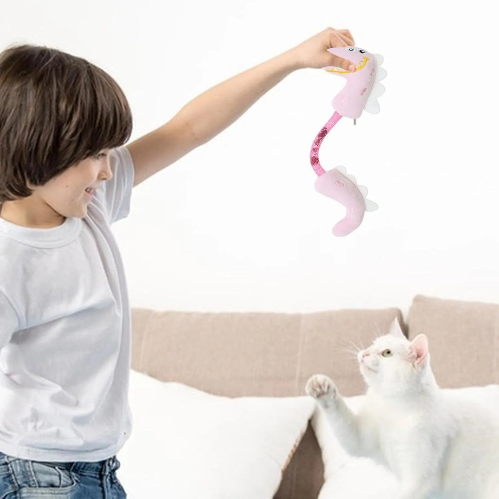 Set of four colourful plush cat toys including a fish, mouse, bunny, and rope on a plain background.