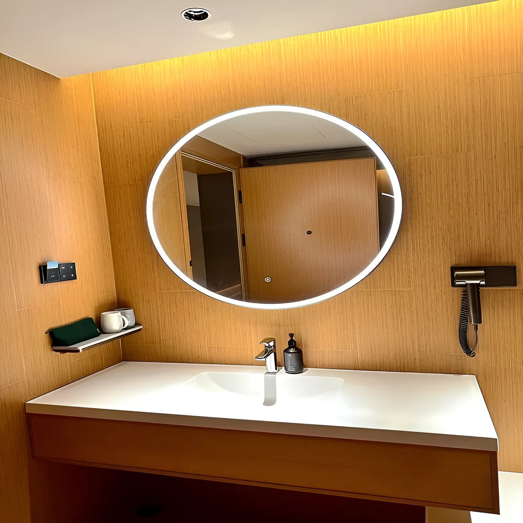 Round black aluminium framed wall mirror with integrated LED lighting and touch controls.