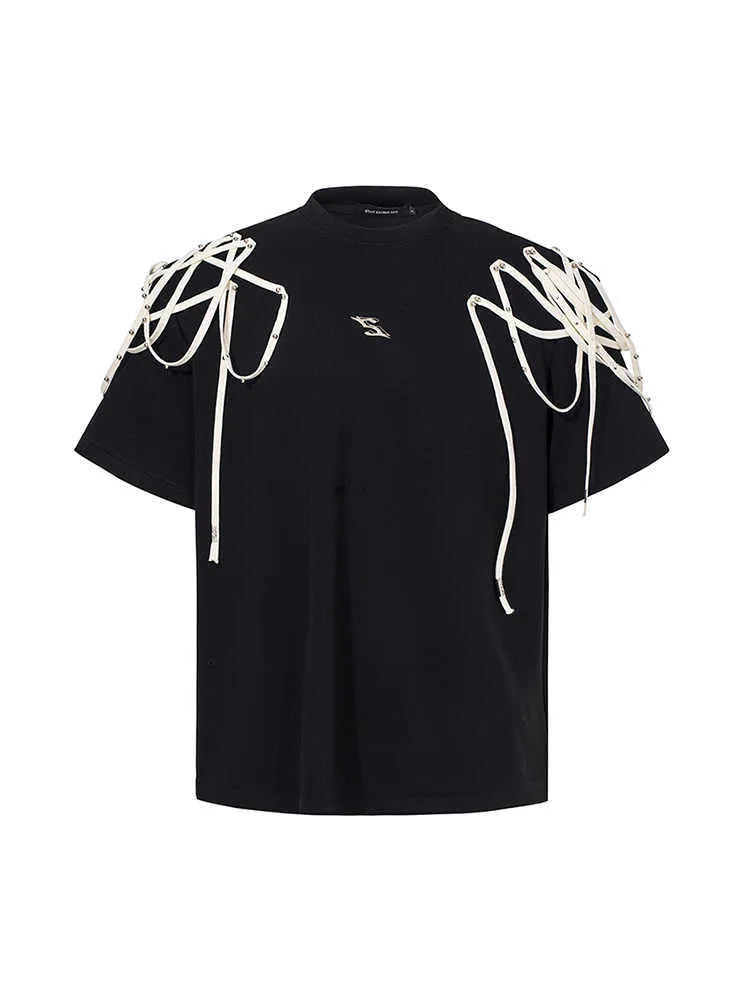Black loose fit T-shirt with padded shoulder detail and rivet ribbon accent.