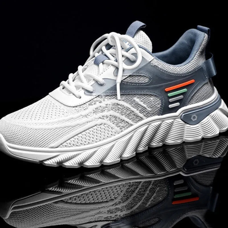 Men's white blue and black platform casual running shoes with cross straps and mesh upper.