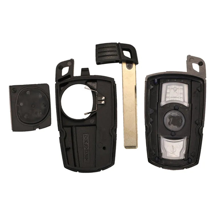 BMW semi-intelligent remote car key fob replacement unit containing three keys.