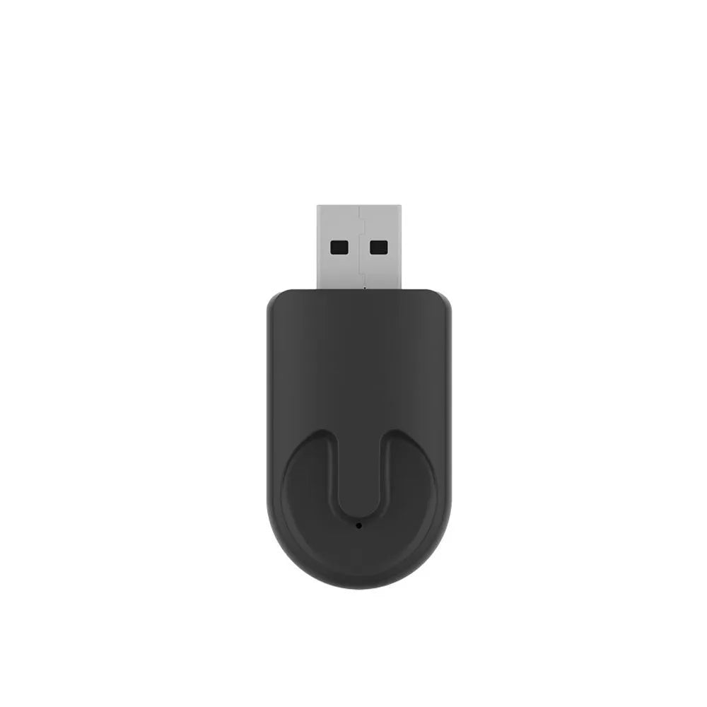 Black wireless CarPlay USB adapter with compact rectangular design