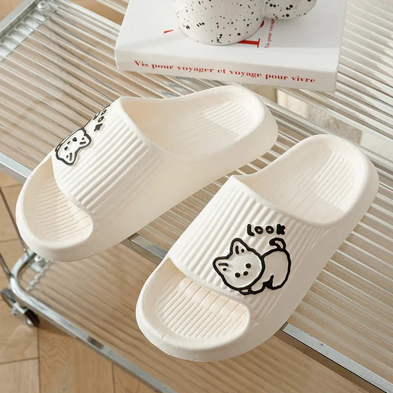 Green EVA foam cat slippers with thick platform sole and anti-slip pattern.