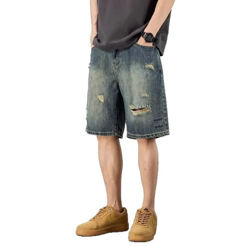 Men's blue retro loose hole denim shorts with straight leg fit