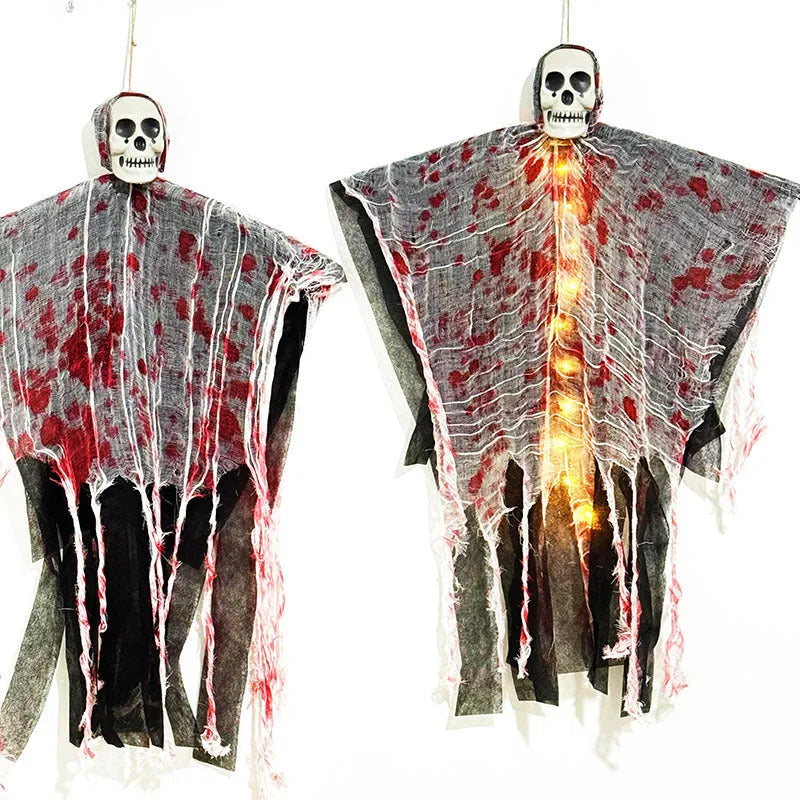 Plastic Halloween decoration of a luminous blood-dyed skull hanging ghost with string