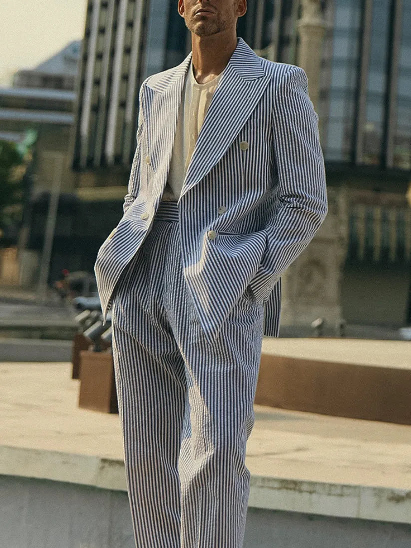 Blue and white striped polyester suit set with blazer and matching trousers