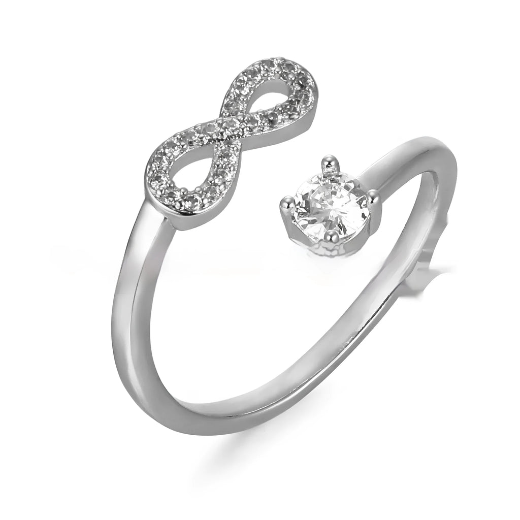 Personalised open ring with a zircon letter on a geometric gold metal band