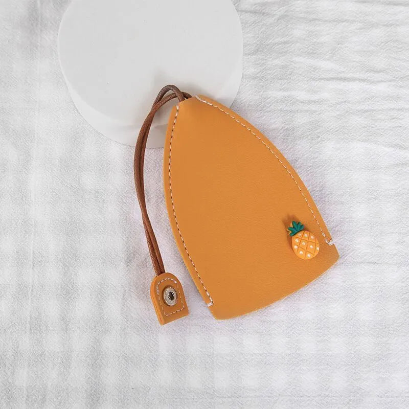 Cartoon pull-out key case in PU leather measuring 14 by 7.5 centimetres
