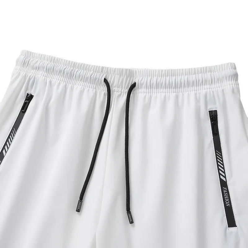 Men's quick-drying nylon sports shorts in loose fit with medium elastic waistband