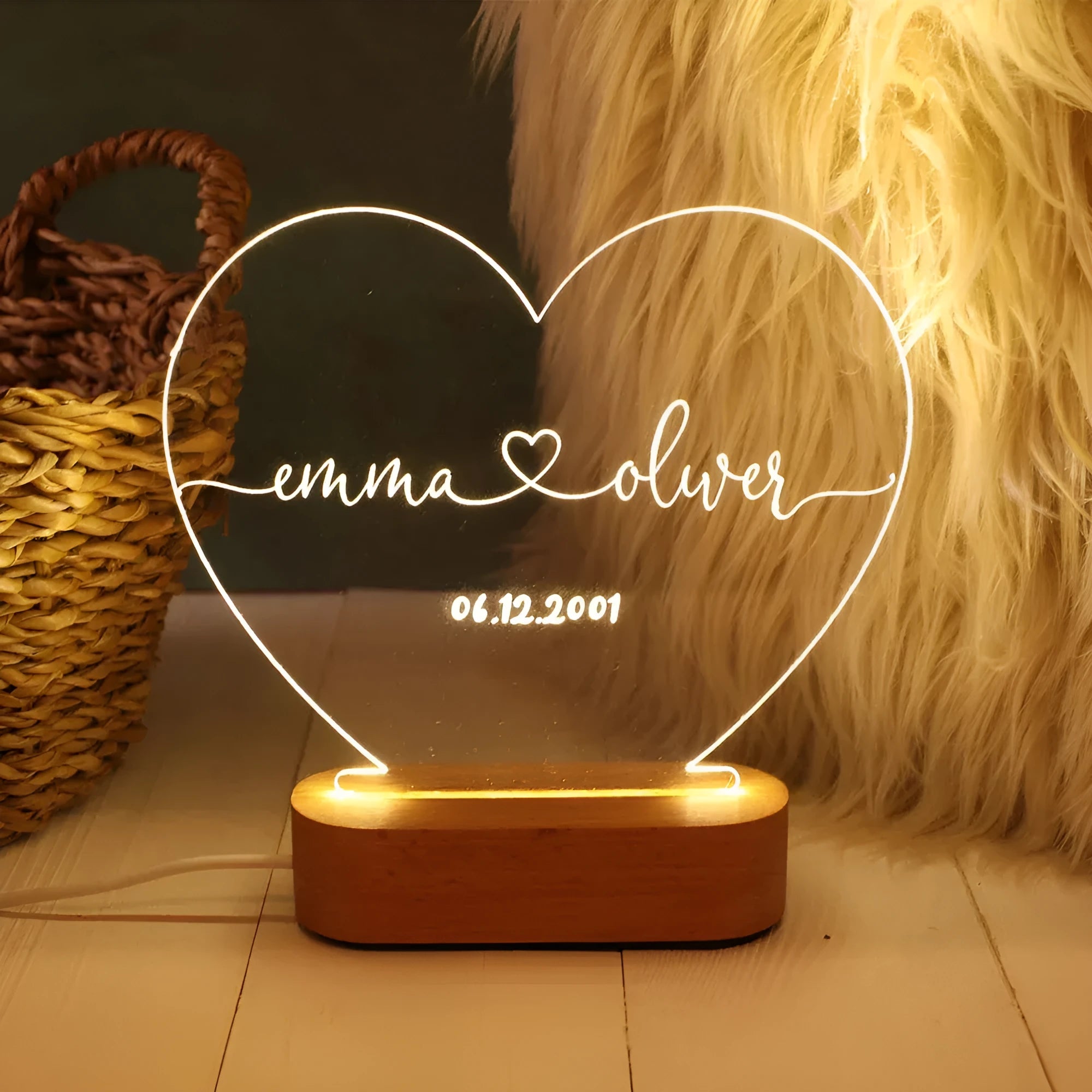 Custom acrylic LED night light displaying personal names and date, 20cm by 11.5cm, with USB cable.