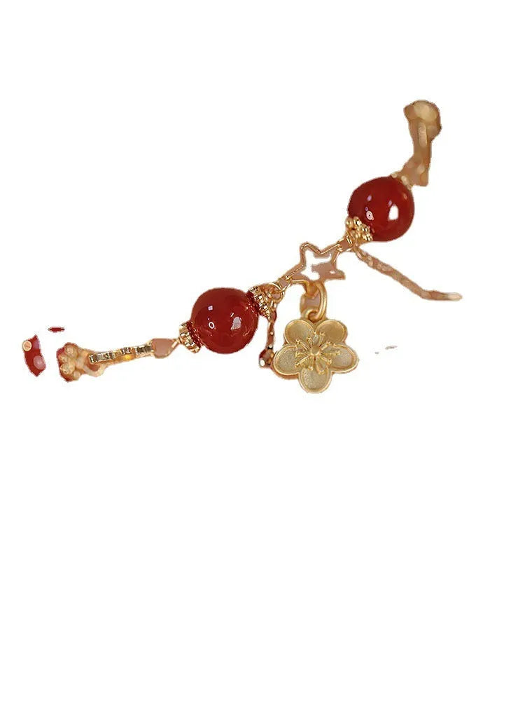 Women's double layer red agate bracelet with peach blossom flower elements and ethnic design