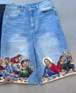 Men's blue cotton shorts with Jesus print on back pocket showing tapered leg design