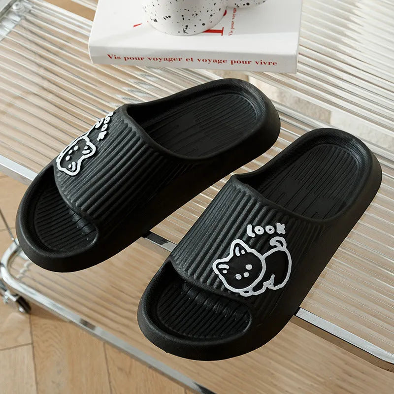 Green EVA foam cat slippers with thick platform sole and anti-slip pattern.