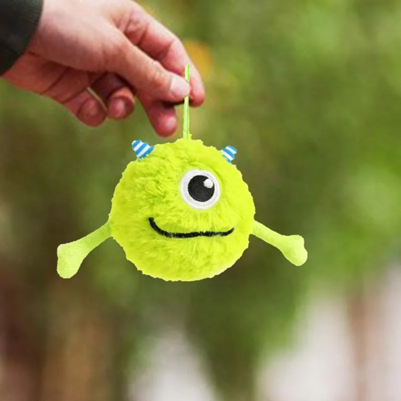 Green interactive sound dog teething ball toy approximately 12cm diameter made from plush and TPR materials