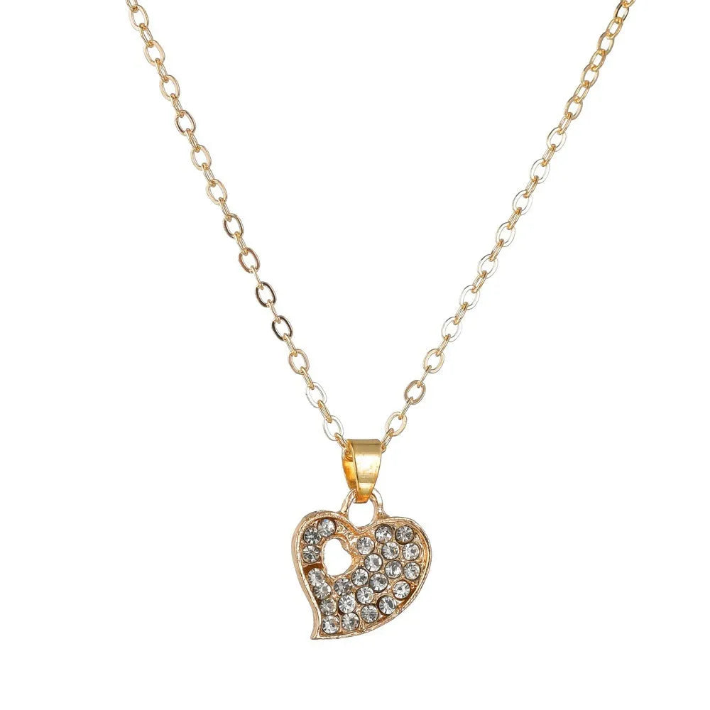 Gold-colour alloy jewellery set with love, water drop and bell patterns including earrings, decorative items and hand ornaments