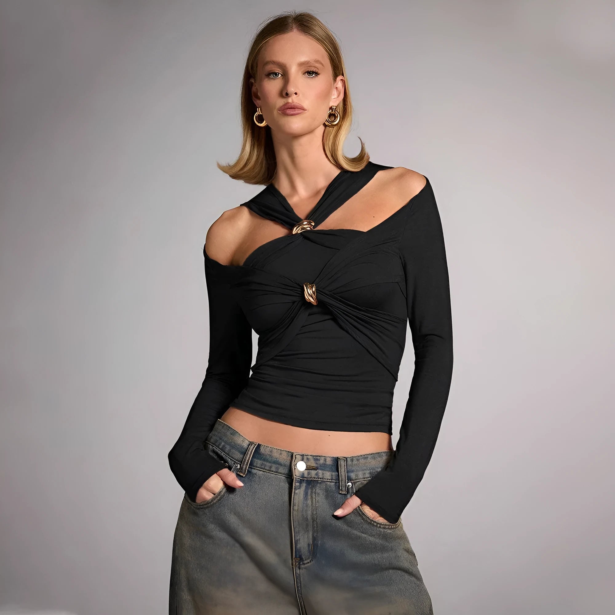 Black women's halter neck top with shoulder-baring design and slim fit silhouette