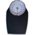 Black mechanical pointer body weight scale with large dial on a simple platform.