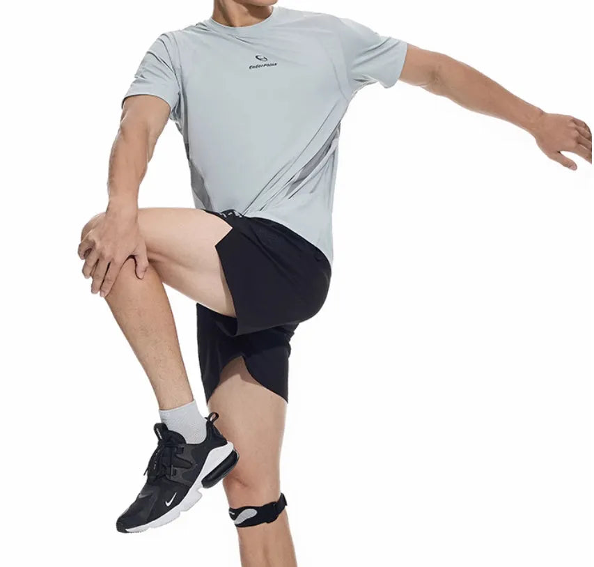 Close-up of black four-point stretch running shorts showing laser stitching detail on spandex fabric.