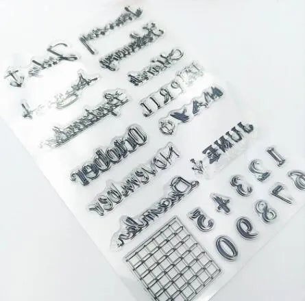 Close-up of a transparent silicone vintage calendar seal stamp showing a digital table icon design.