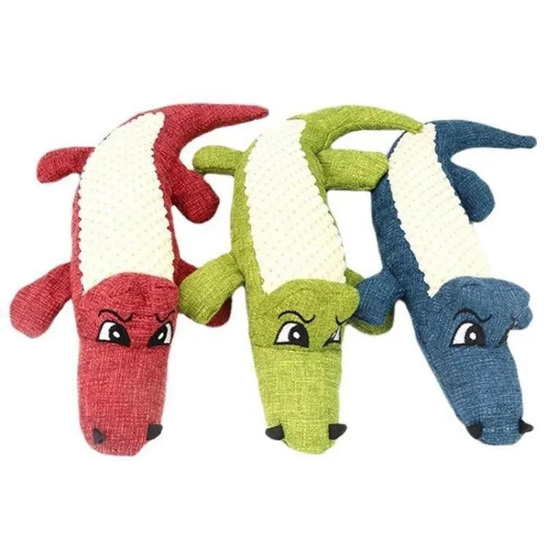 Blue, green, and red corn grid patterned plush toys for cats and dogs with a biting sound feature.