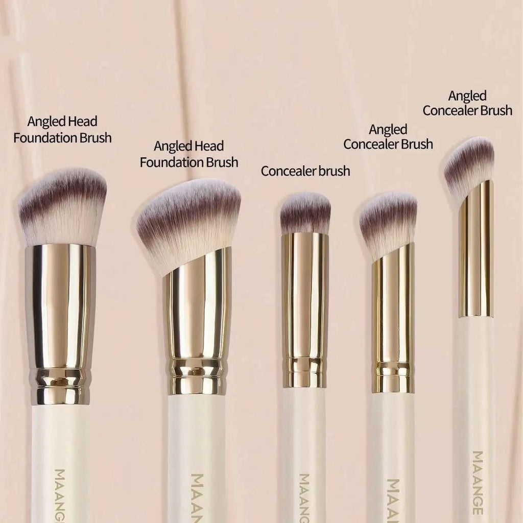 Five apricot coloured makeup brushes with angled blush brush design on white background