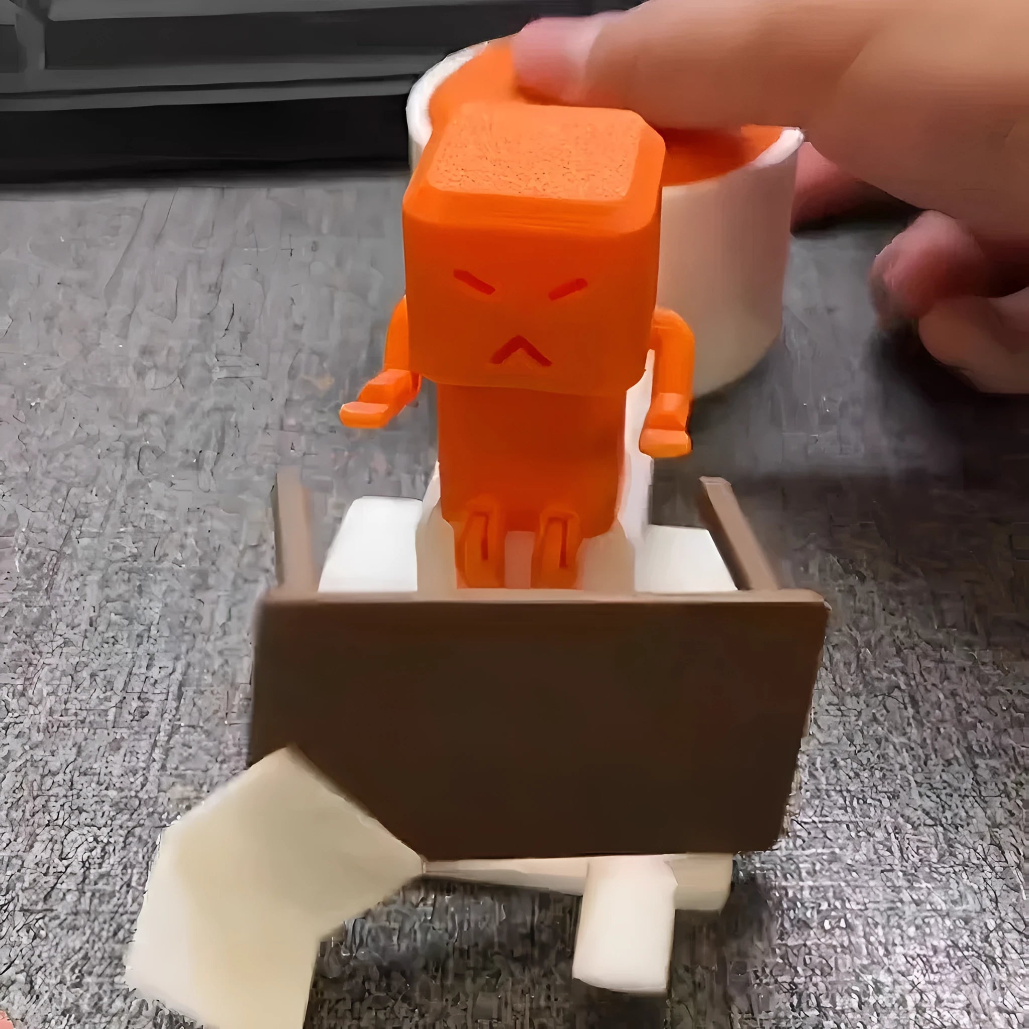 Orange plastic table turning decompression toy for desk stress relief