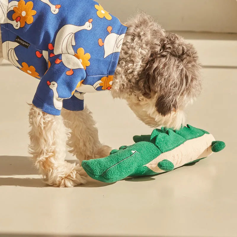 Green plush dog toy on a white background showing its 35cm height and soft fabric texture.