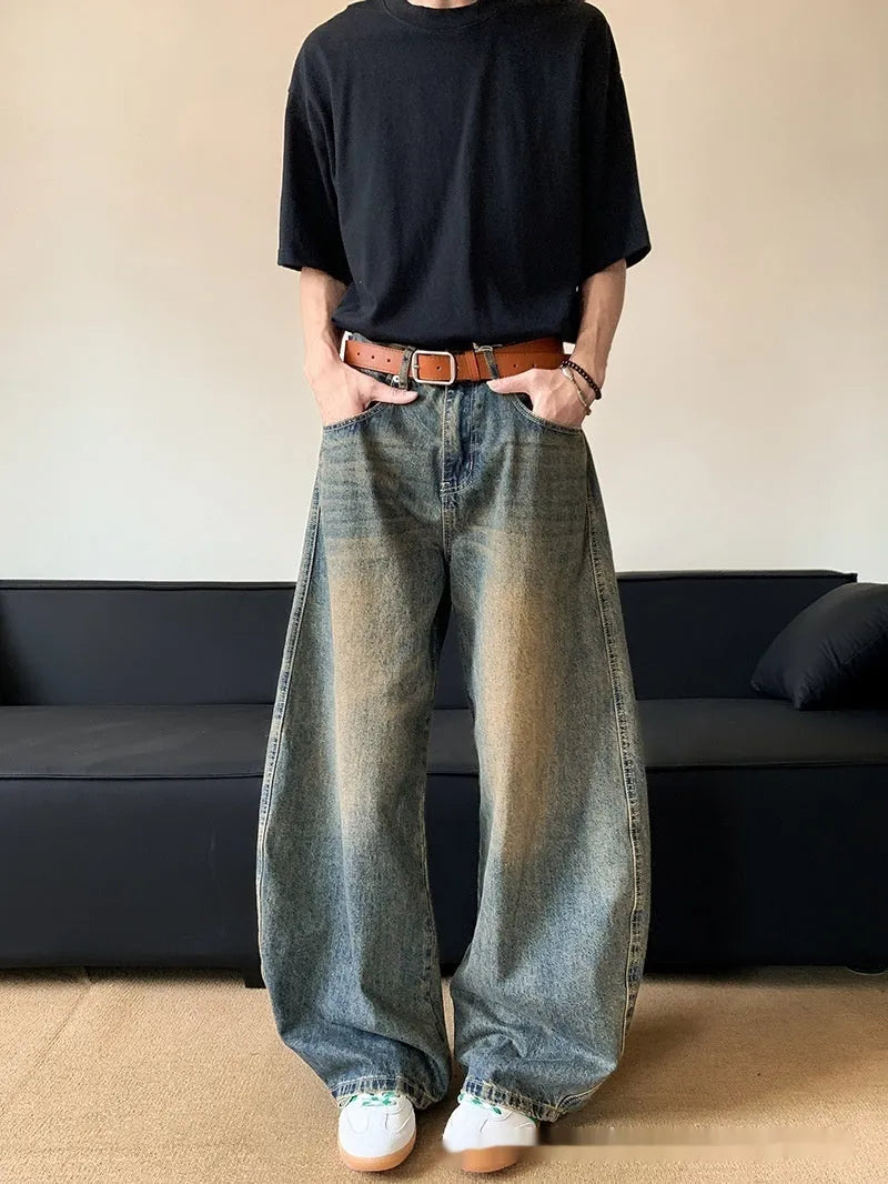 Men's retro blue distressed jeans with wide-leg cut and micro-elastic cotton blend fabric