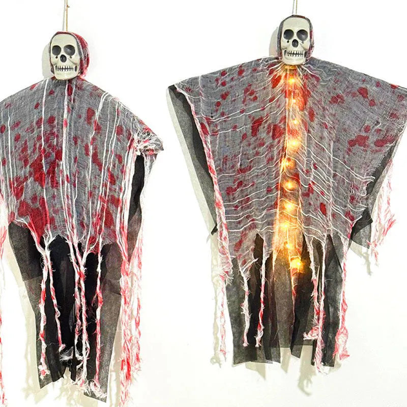 Plastic Halloween decoration of a luminous blood-dyed skull hanging ghost with string