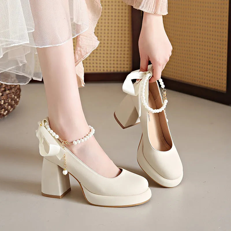 Women's beige Mary Jane shoes with chunky heel and pearl ankle-strap buckle on round toe design