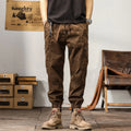 Men's khaki peacock green harem pants with tapered ankle bands and mid-waist design