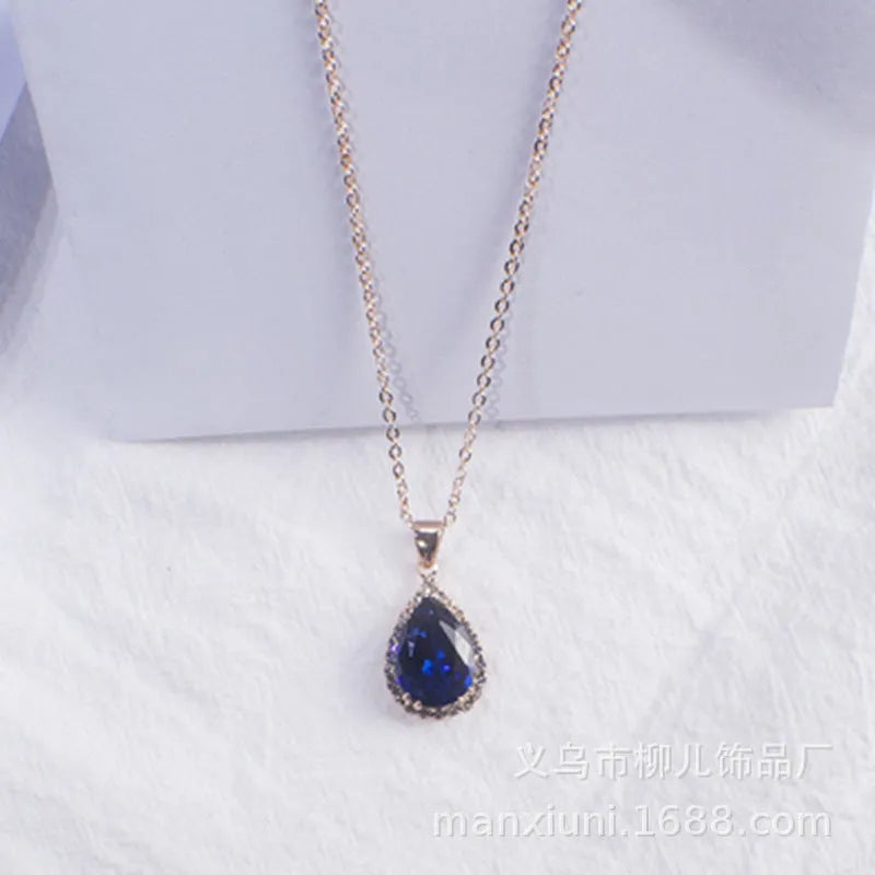 Pink rose gold drop shape rhinestone necklace with geometric design on alloy chain