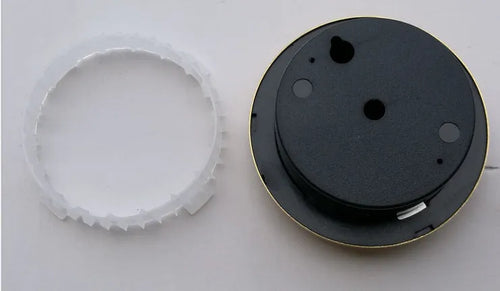 Analogue thermometer and hygrometer with aluminium ring and dial showing temperature and humidity readings