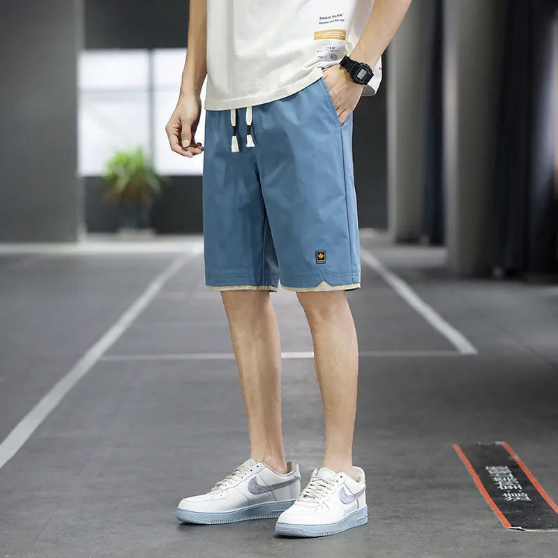 South Korea style casual beach shorts with loose fit and straight cut in micro-elastic polyester fabric