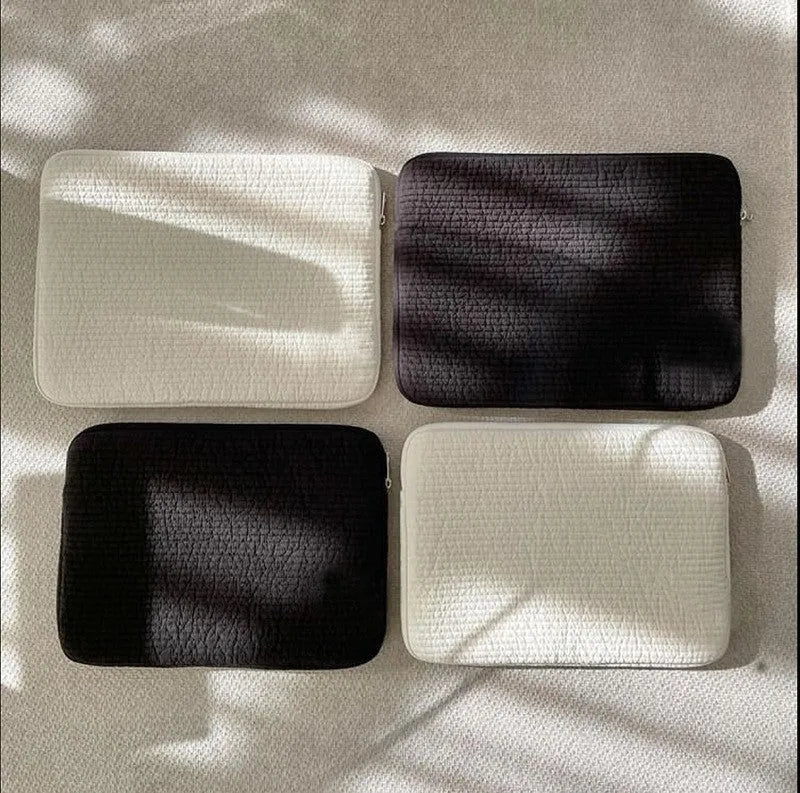 Black and white cotton clutch bag for tablets, shown in 11-inch, 13-14-inch, and 15-15.6-inch sizes with a coin pocket.