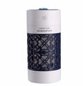 Lucky desktop humidifier 250ml USB powered in black with blue water bottle showing mist output on office desk